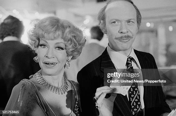 English actors Yootha Joyce and Brian Murphy pictured together in character as Mildred and George Roper on the set of the film version of the...