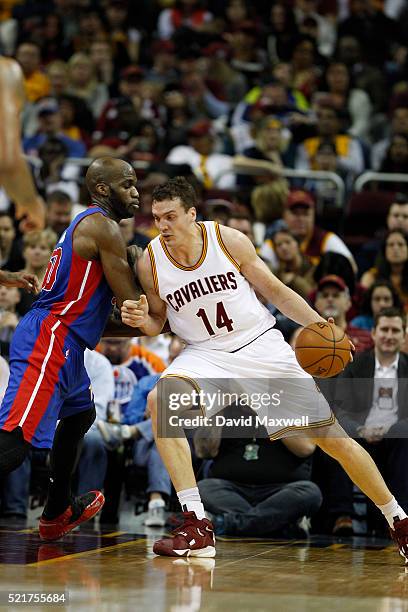 Sasha Kaun of the Cleveland Cavaliers works against Joel Anthony of the Detroit Pistons at Quicken Loans Arena on April 13, 2016 in Cleveland, Ohio....