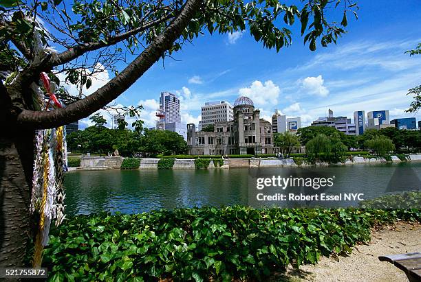 offerings hanging from tree at hiroshima peace memorial park - hiroshima peace memorial park stock pictures, royalty-free photos & images