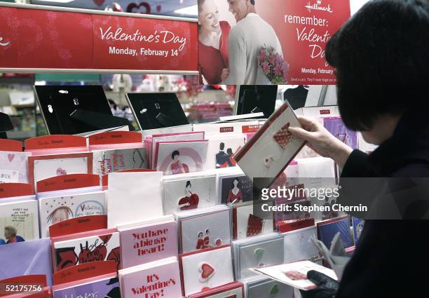 Woman shops for Valentines Day cards at a Hallmark store on the Upper West Side February 10, 2005 in New York City. According to retail projections,...