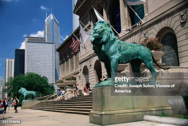 lion statues adorn entrance of art institute and museum of chicago - chicago art museum stock pictures, royalty-free photos & images
