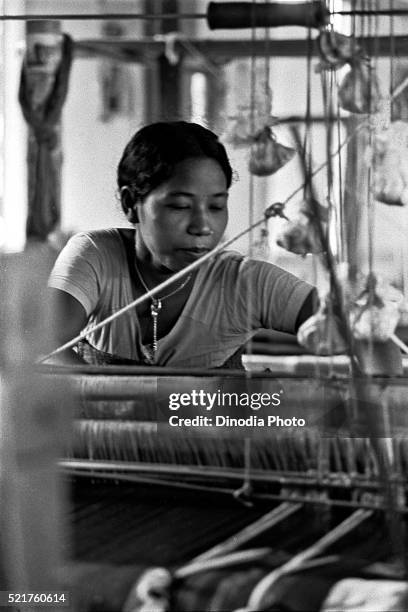 bodo woman weaving on handloom, assam, india - handloom stock pictures, royalty-free photos & images