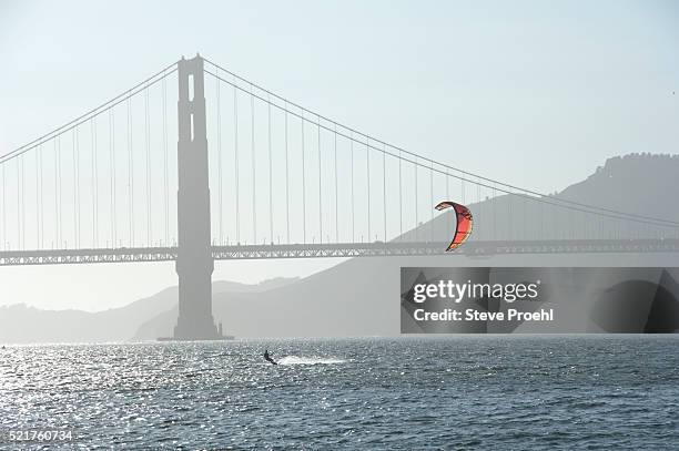 kite surfer on the san francisco bay - san francisco bay stock pictures, royalty-free photos & images