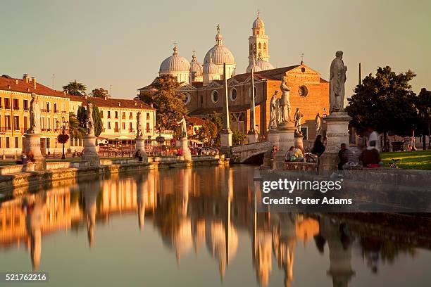 prato della valle statues and basilica di santa giustina - padua stock pictures, royalty-free photos & images