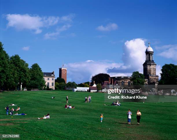 people in park near st. chad's church - shrewsbury england ストックフォトと画像