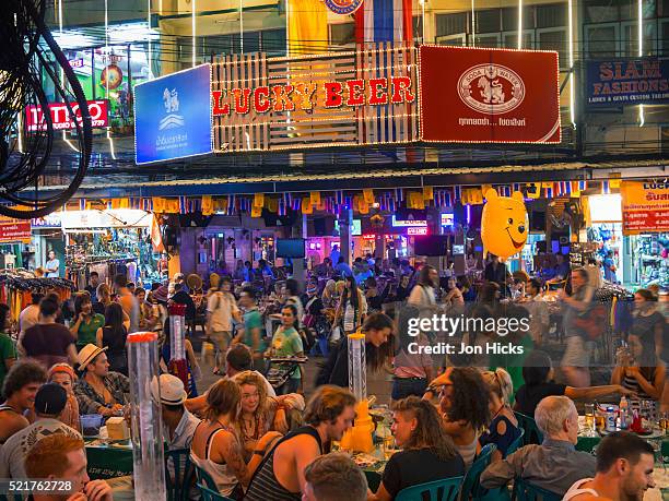 a busy bar in khao san road, bangkok - khao san road stock pictures, royalty-free photos & images