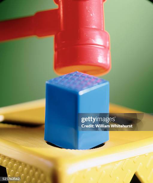 square peg in round hole - futility stock pictures, royalty-free photos & images