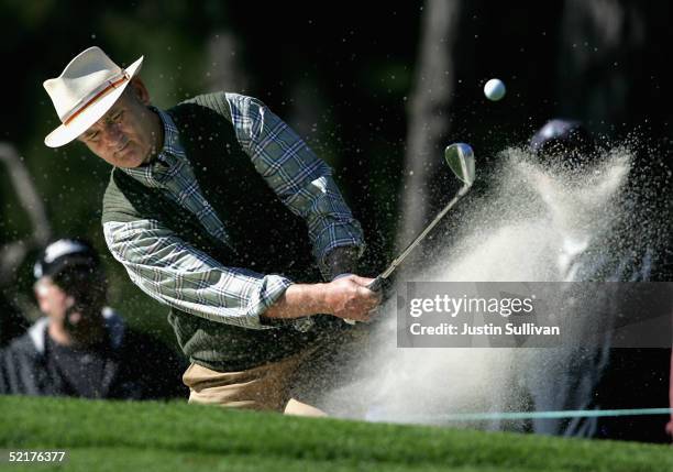 Actor Bill Murray hits out of the bunker on the 10th hole at Spyglass Hill Golf Course during the first round of the AT&T Pebble Beach Pro-Am...