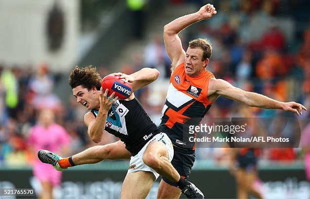 Darcy Byrne-Jones of the Power and Steve Johnson of the Giants contest a mark during the round four AFL match between the Greater Western Sydney...