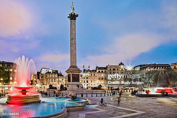 nelson monument on trafalgar square - trafalgar square stock-fotos und bilder