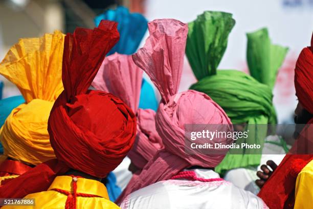 sikh men in celebrations of consecration of sikh guru granth sahib, nanded, maharashtra, india - siquismo imagens e fotografias de stock