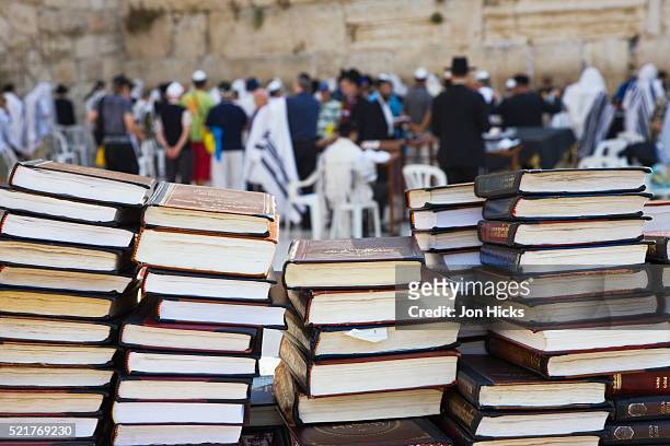 books for religious study at the western wall - jewish people ストックフォトと画像