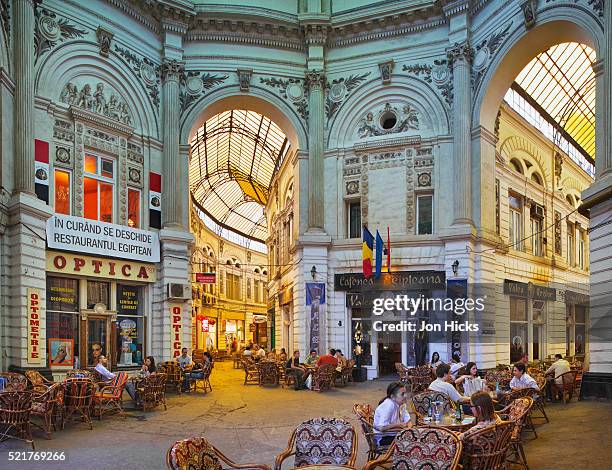 arcade of bars and cafes - bucharest 個照片及圖片檔