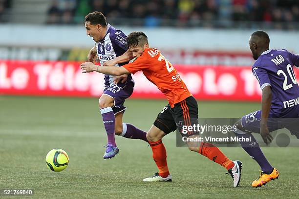 Adrien Reagttin of Toulouse and Maxime Barthelme of Lorient during the French Ligue 1 between Lorient and Toulouse at Stade du Moustoir on April 16,...