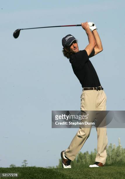 Musician Kenny G hits his tee shot on the sixth hole during the first round of the AT&T Pebble Beach National Pro-Am on February 10, 2005 at Spyglass...