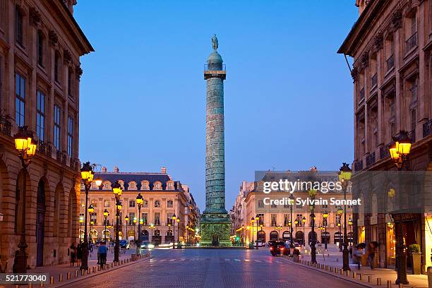 vendome column, place vendome, paris, france - place vendome stock pictures, royalty-free photos & images