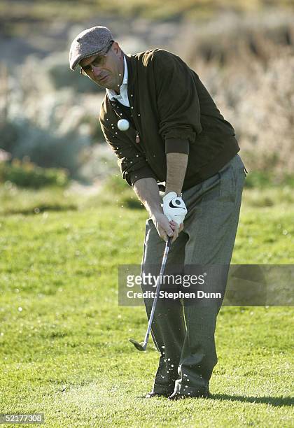 Actor Kevin Costner chips on the second hole during the first round of the AT&T Pebble Beach National Pro-Am on February 10, 2005 at Spyglass Hill...