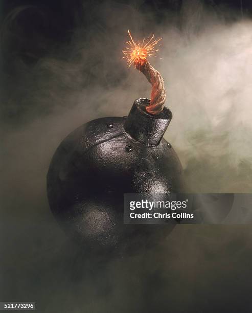 lit cannonball - bomb stock pictures, royalty-free photos & images