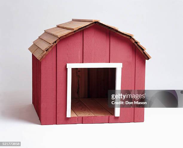 doghouse for a farm dog - käfig stock-fotos und bilder