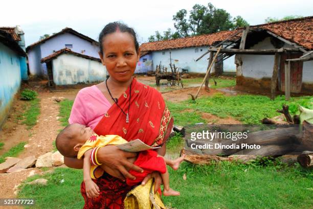 ho tribes woman with baby, chakradharpur, jharkhand, india - chakradharpur stock pictures, royalty-free photos & images