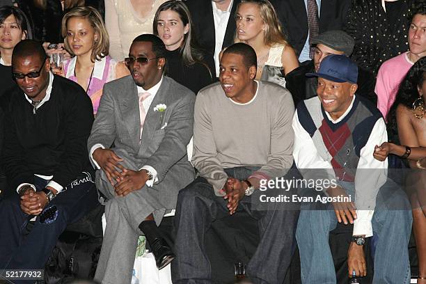 Andre Harrell, Sean "P. Diddy" Combs, Jay-Z and Russel Simmons attend the Zac Posen Fall 2005 show during the Olympus Fashion Week in Bryant Park...