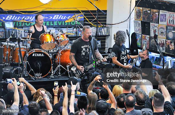 Lars Ulrich, James Hetfield and Kirk Hammett of Metallica perform on Record Store Day at Rasputin Music on April 16, 2016 in Berkeley, California.