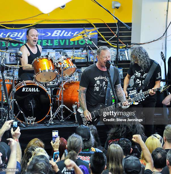 Lars Ulrich, James Hetfield and Kirk Hammett of Metallica perform on Record Store Day at Rasputin Music on April 16, 2016 in Berkeley, California.