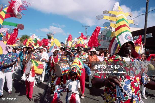 Costumed dancers parade during Carnival Miami along Calle Ocho, . A two week celebration of Hispanic culture ends with the Calle Ocho Open House...