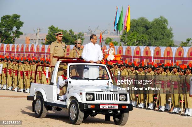 mr ashok gehlot examine ladies police parade at police training centre - indian police officer image with uniform stock-fotos und bilder