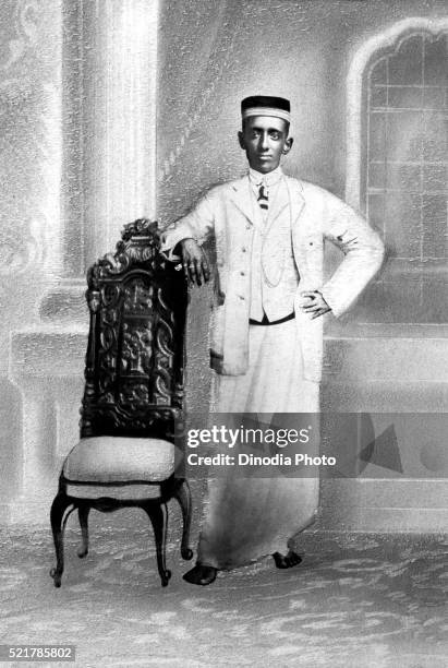 old picture of nattukottai chettiar or nagarathar, chettinad, tamil nadu, india - man coat stock pictures, royalty-free photos & images