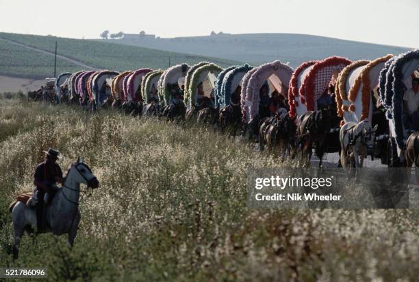 Wagon train heads back to Jerez from El Rocio after the Pilgrimage of the Dew, Spain.