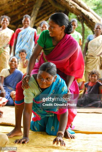 ho tribes women playing piggybacking and sharing medical information, chakradharpur, jharkhand, india - chakradharpur stock pictures, royalty-free photos & images