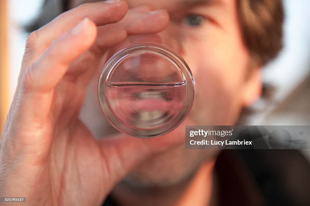 Man drinking a glass of water