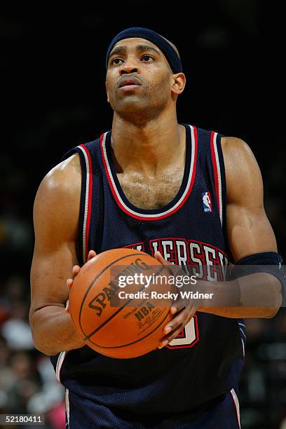 Vince Carter of the New Jersey Nets shoots a free throw during the game with the Golden State Warriors at the Arena in Oakland on January 26, 2005 in...