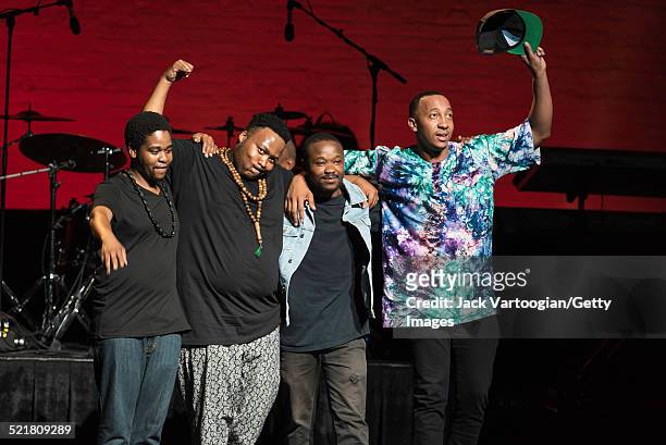 South African rapper Tumi Molekane and his band take a bow after their performance at the 'Africa Now! South Africa!' concert at Harlem's Apollo...
