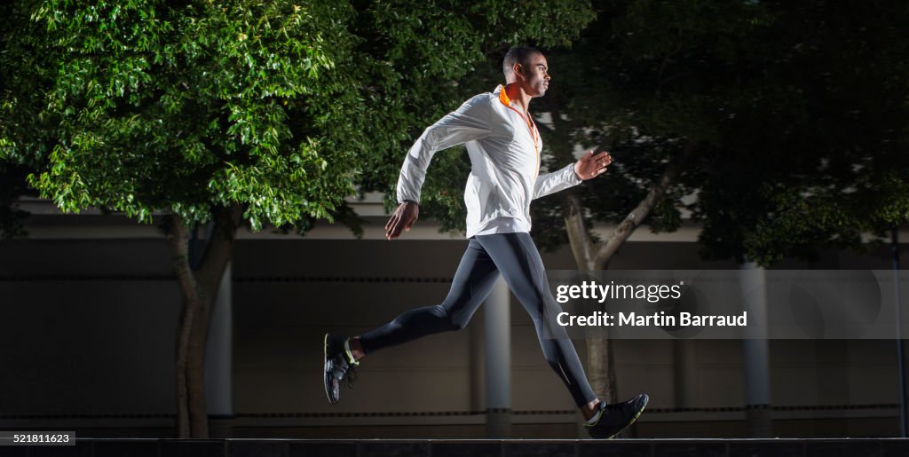 Man running through city streets