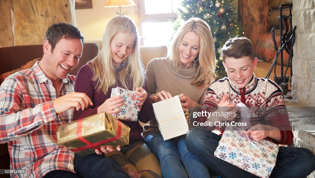 Family opening gifts on Christmas