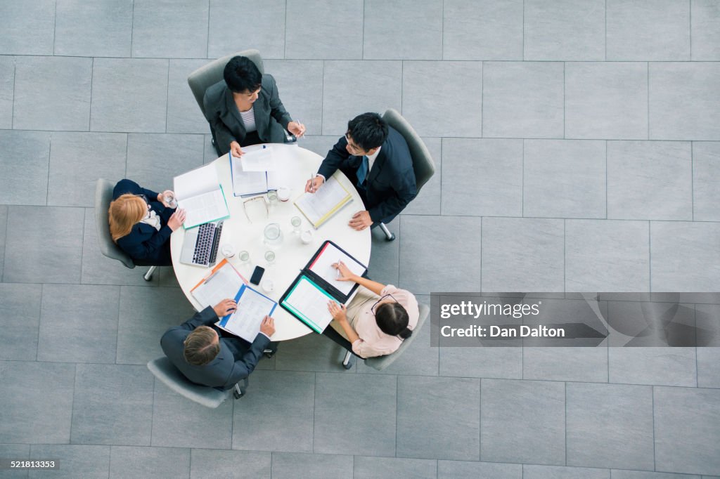 Business people having meeting at table