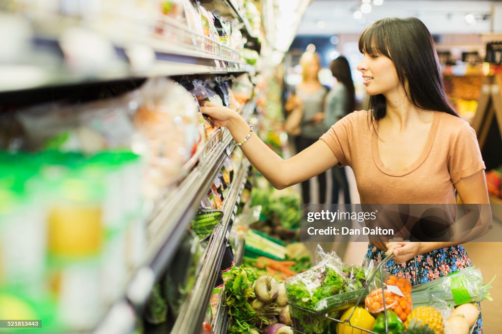 Woman shopping in grocery store