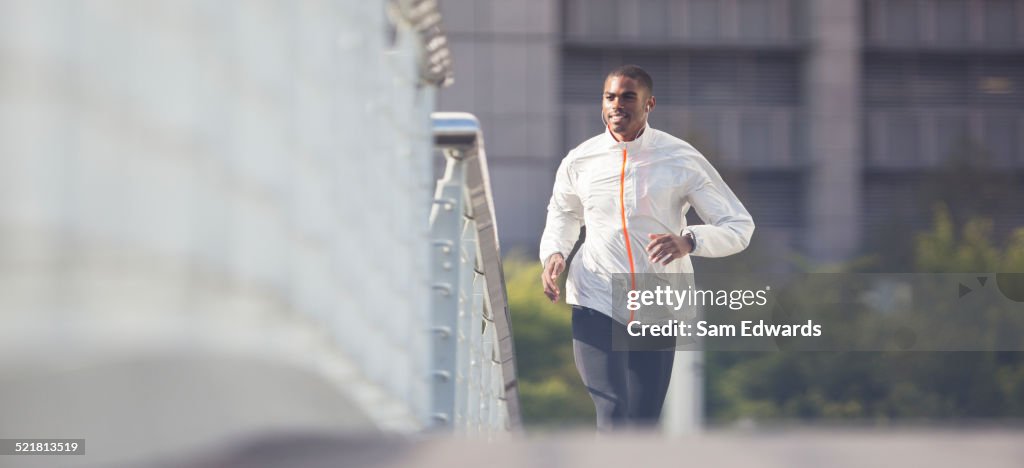 Man running through city streets