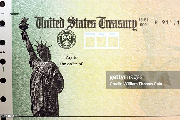 Blank Social Security checks are run through a printer at the U.S. Treasury printing facility February 11, 2005 in Philadelphia, Pennsylvania. As...