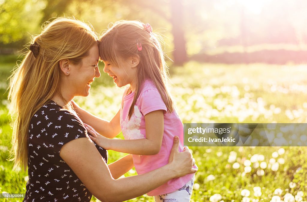 Mother and child together in nature in springtime