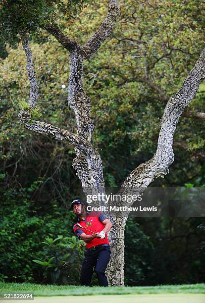 Pablo Larrazabal of Spain plays his second shot from the rough on the 12th hole during the final round on day four of the Open de Espana at Real Club...