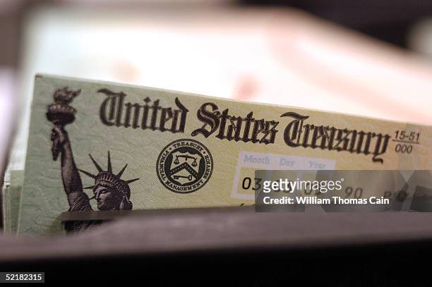 Blank Social Security checks are run through a printer at the U.S. Treasury printing facility February 11, 2005 in Philadelphia, Pennsylvania. As...