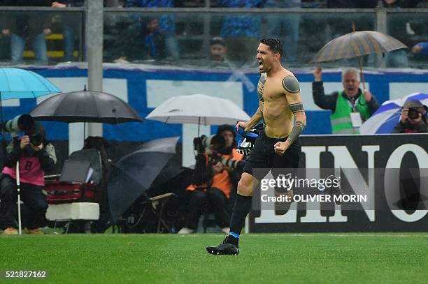 Atalanta's midfielder from Italy Marco Borriello celebrates after scoring his second goal during the Italian Serie A football match Atalanta vs AS...