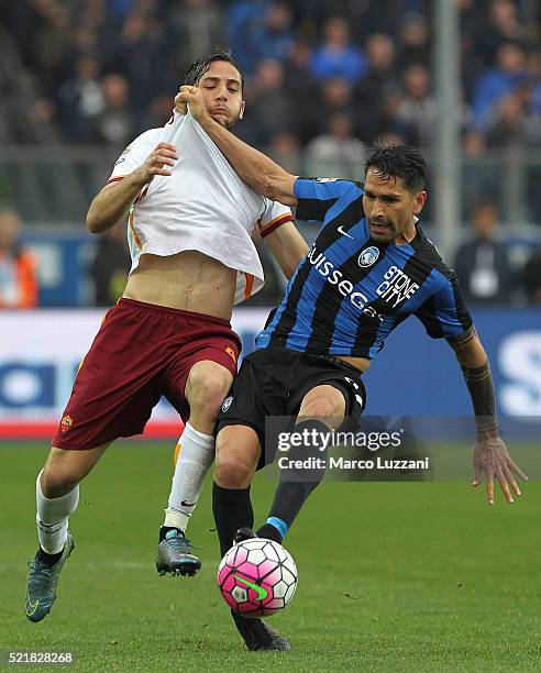 Marco Borriello of Atalanta BC competes for the ball with Konstantinos Manolas of AS Roma during the Serie A match between Atalanta BC and AS Roma at...