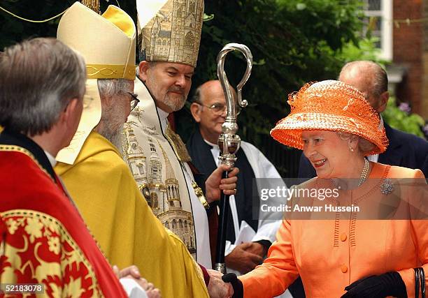 Queen Elizabeth II meets The Archbishop of Canterbury, Dr Rowan Williams on July 17, 2003 during her visit to St Bartholomews The Great in London,...