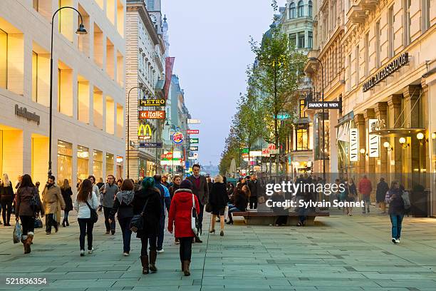 vienna, karntner strass at dusk - kohlmarkt street fotografías e imágenes de stock