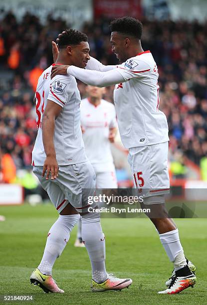 Daniel Sturridge of Liverpool celebrates with team mate Jordan Ibe after scoring his team's second goal of the game during the Barclays Premier...