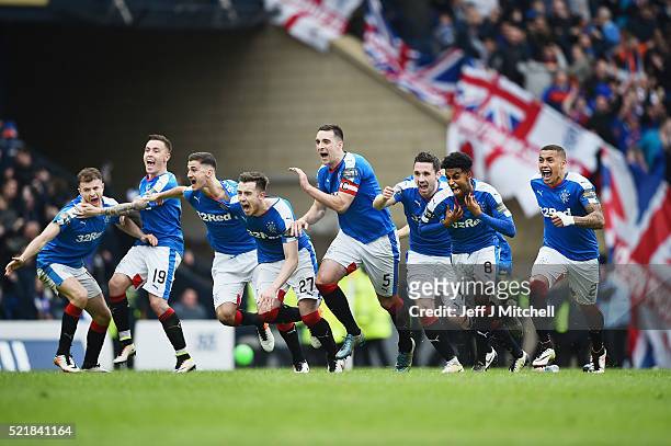 Rangers players celebrate after beating Celtic in a penalty shoot out during the William Hill Scottish Cup semi final between Rangers and Celtic at...